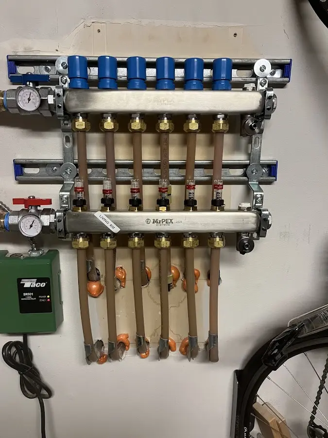 Plumber performing Leak Detection at a residential property in Woodridge